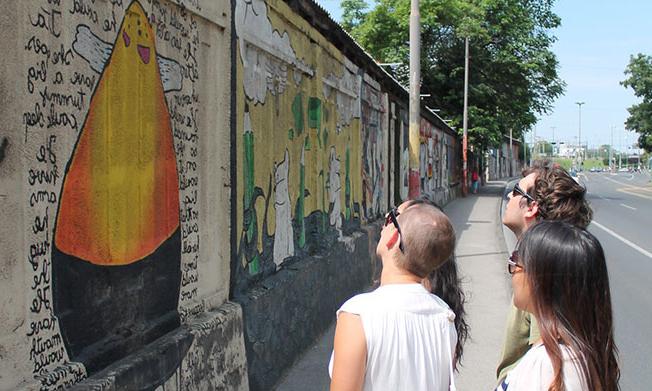 Students viewing the first publicly supported graffiti art project in the new millennium in Croatia’s capital Zagreb.