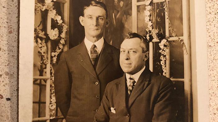 Sepia photo of two gentlemen