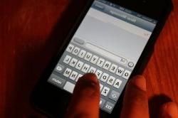 stock photo of someone texting
