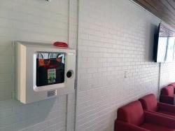 An AED machine on the wall of the Student Center.