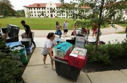Students moving into Montclair State with all of their belongings.