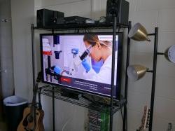 A television in a student's dorm room on the University's website.